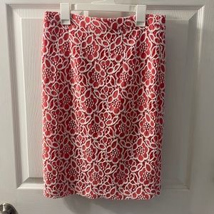 Eva Mendes pencil skirt. Size 4. Pink with lace overlay.